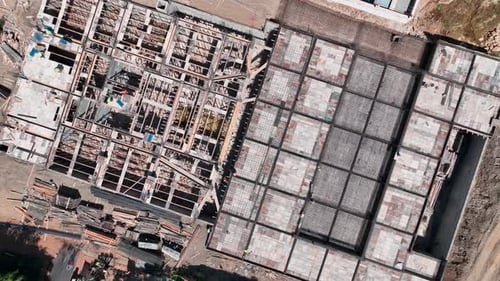 Aerial View Rebar Tying for Foundation Work on a Large Construction Project