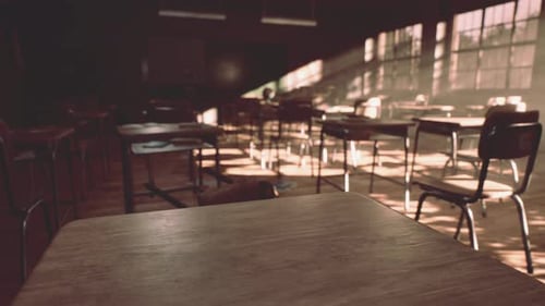 View to Classroom with Tables and Small Blackboard and Grungy Walls