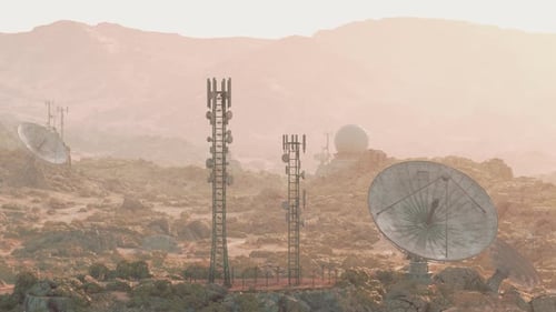 A Group of Satellite Dishes on a Desert Landscape Capturing Signals From Space