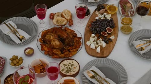 Top View of Served Dinner Table for Five in Countryside