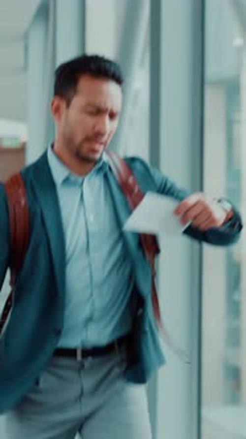 Businessman, watch or rush with ticket for flight delay, boarding pass or late schedule in airport