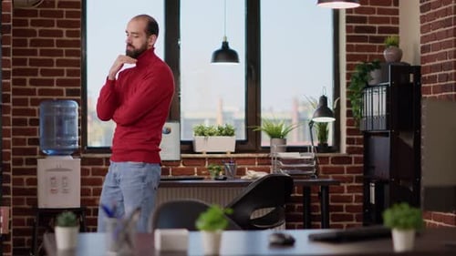 Indecisive Employee Walking Around Office and Thinking About Strategy