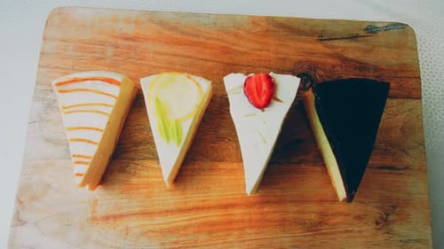 Four Kinds of Cheesecake Arranged in a Row