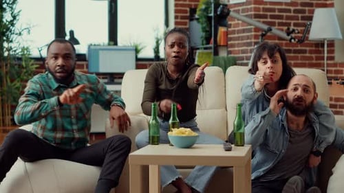 Friends React to Sports Game on Television