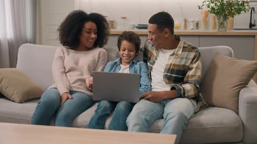 Happy African American Family Using Modern Laptop Mother Mom Woman Female Dad Father Man Male Help