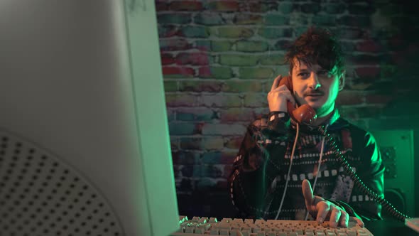 Computer Nerd From 1980s Talking Over Landline Telephone in Front of ...