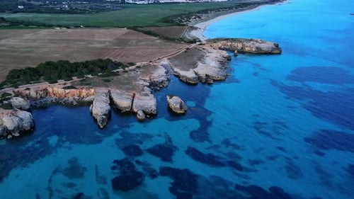 Coastline seen at blue hour from drone aerial view in Spain.