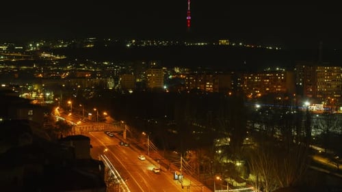 Night Cityscape View with Traffic Light Streaks