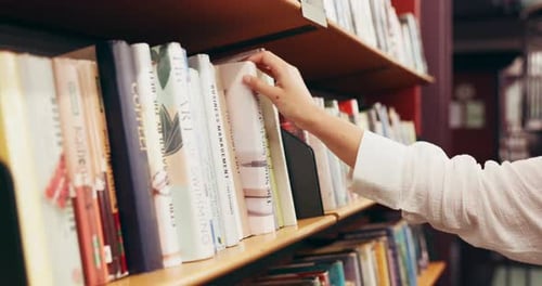 Choosing, books and hands of woman in library at university for research, learning or knowledge