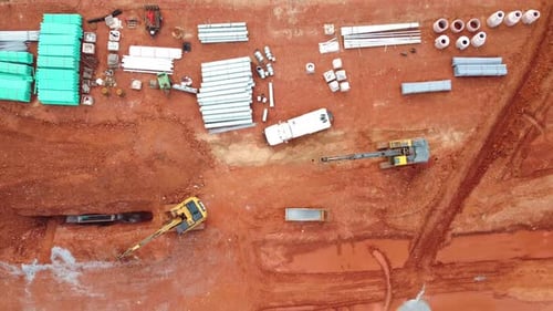 Underground pipes and construction equipment from an aerial view