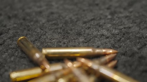 Close Up of Bullets on a Textured Surface