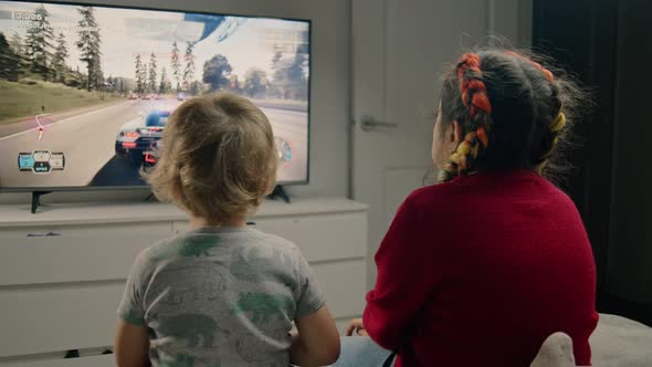 Siblings Racing Game Fun Laughter And Smiles At Home Together, People ...