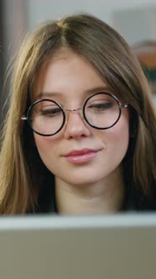 Close Up on Charming Calm in Good Mood Woman Freelancer Which Remotely Working Typing on Computer in