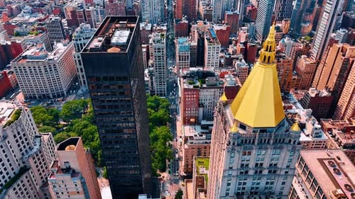 Flying among the tops of skyscrapers in the panorama of New York.