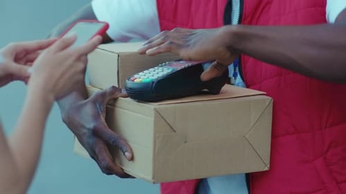 Young African American Hands Courier Delivery Service Holds Box Woman Pay Online Via Terminal Order
