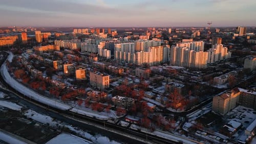 City Block with Residential Buildings From the Height of the Flight at Sunset