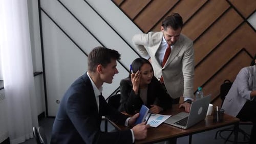 Business People Discussing Over New Business Project in Office