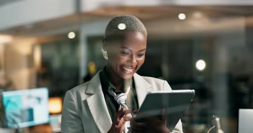 Tablet, night and business black woman in office for research project, website review and internet