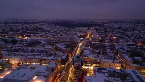 Berlin Steglitz shopping street in Snow at winter evening. Beautiful aerial view drone
