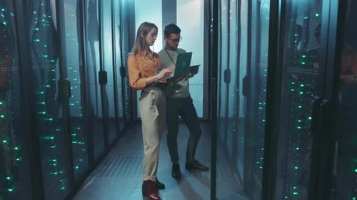 Professionals Collaborating Together in a StateoftheArt Modern Data Center Environment