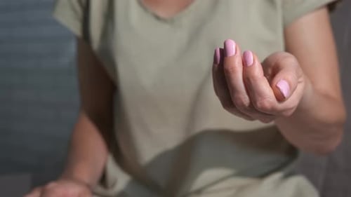 Hand Holding Prescription Medicine for Health Care