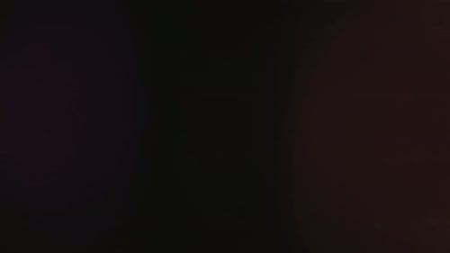 Abstract Overlay with Two Spot Light Transition Lens Flare Flashes Effects on Dark Background