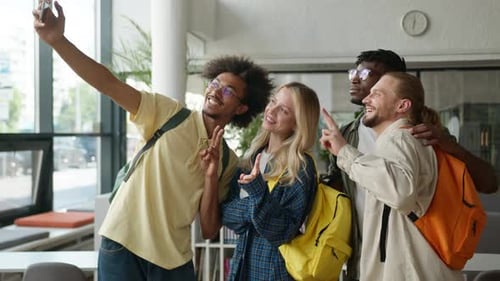 Friends Smiling and Posing for a Selfie