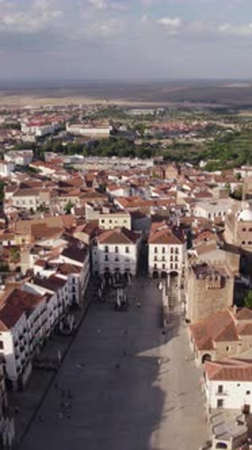 Vertical Aerial Backward Over Tourist Square in Cáceres, Spain
