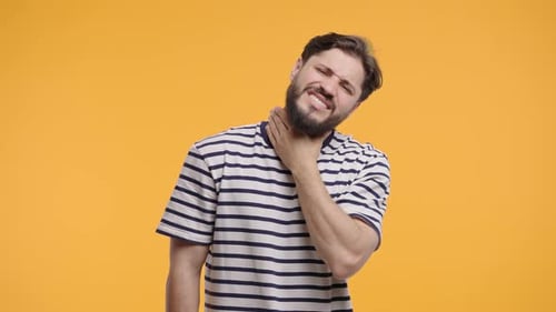 Mature Bearded Man Has Sore Sick Guy With Swollen Throat On Yellow Studio Pain