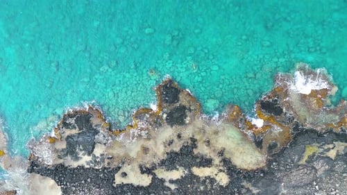 Aerial view of turquoise ocean and coral reef, United States.