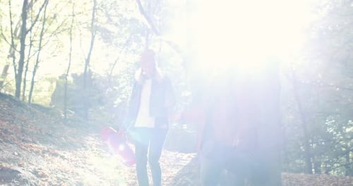 Full Length View of Handsome Man and Woman Tourists Walking Together in Forest Active Backpackers