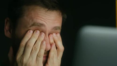 Young Businessman Rubbing Tired Eyes Suffering From Eye Strain Bad Blurry Vision From Long Working