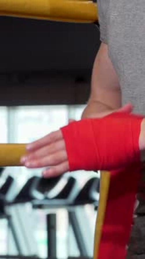 Boxer Wraps Hand in Boxing Ring for Fight
