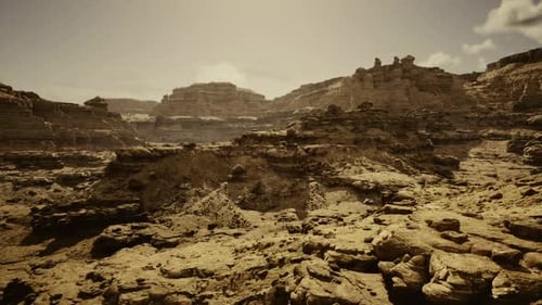 Golden Sunlit Highlands Showcasing Diverse Geological Features and Vistas