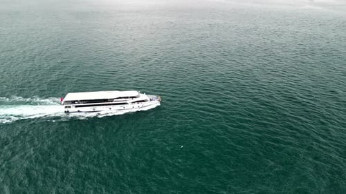 White ferry moving across the strait in Istanbul