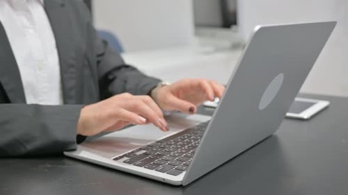 Close up Female Hands Working on Laptop