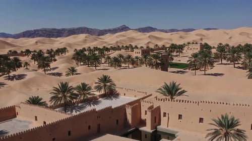 This Stunningly Beautiful Desert Oasis Features Magnificent Palm Trees and Majestic Mountains