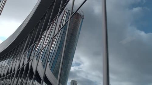 Reflection of Highrise in Glass Building Stock Footage Beautiful Modern Architecture of Glass