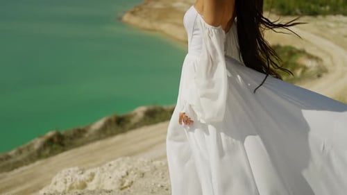 A Bride on Top of a Mountain Overlooking the Ocean