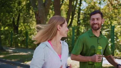 Couple Running Together on a Sunny Day