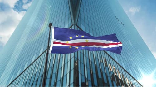 Cape Verde Flag Waving Before Modern Skyscraper