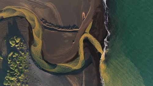 Aerial view of river meeting the sea, Iceland.
