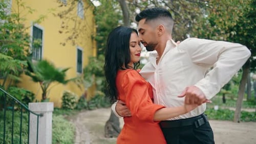 Two Professionals Performing Salsa in City Park Happy Couple Dancing Latino