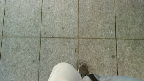 First Person Walking on Sidewalk Point of View