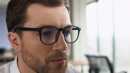 Man in Glasses Close Up Office