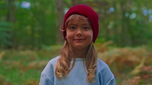 Smiling Child Posing in Forest Portrait