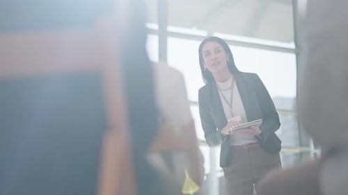 Presentation, conference and woman with tablet talking to audience for tradeshow