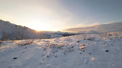 Snowy Mountain Range at Sunrise
