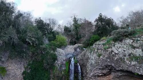 Waterfall Cascading Down a Rocky Cliffside