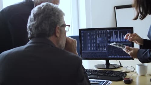 Professional Traders Analyzing Stock Market